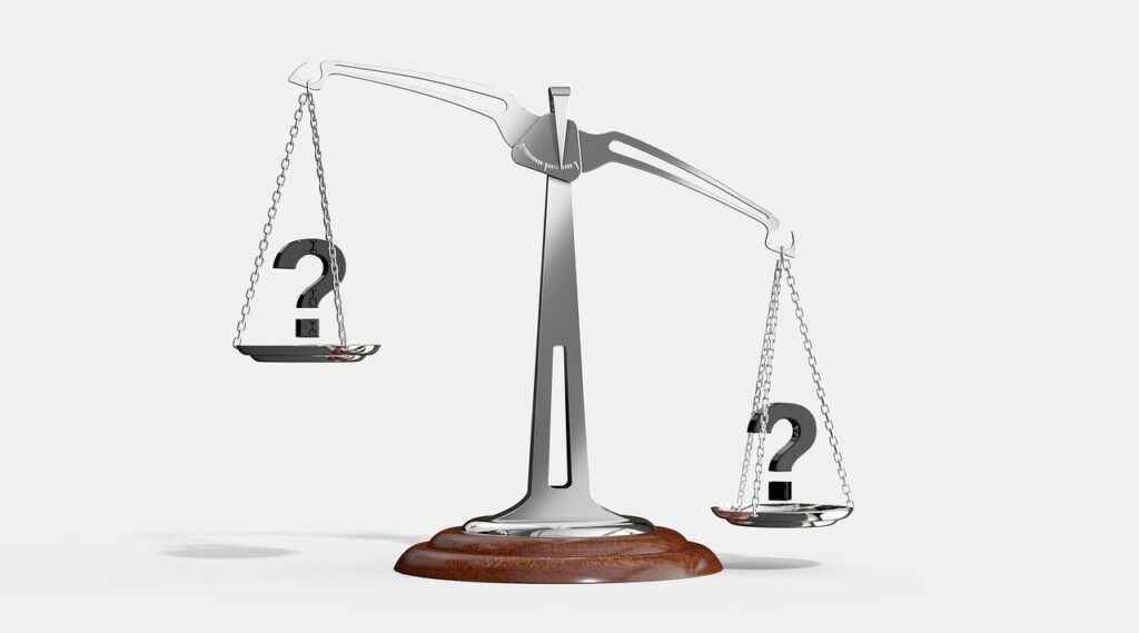 Balancing scale to weigh moral arguments for ethical considerations